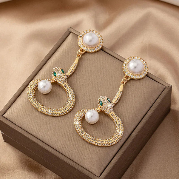 Veile Studios Gold Round Pearl With Crystal Accents And Snake Design For Women Earrings