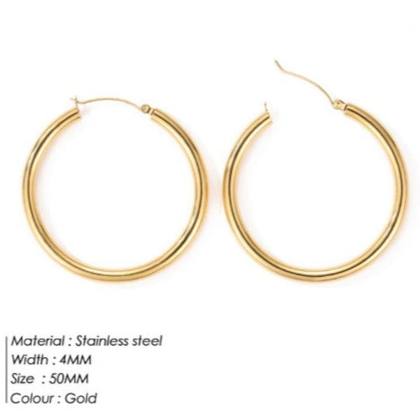 Veile Studios Broad Round Hoops In Gold Stainless Steel For Fashion Jewellery Collection Earrings