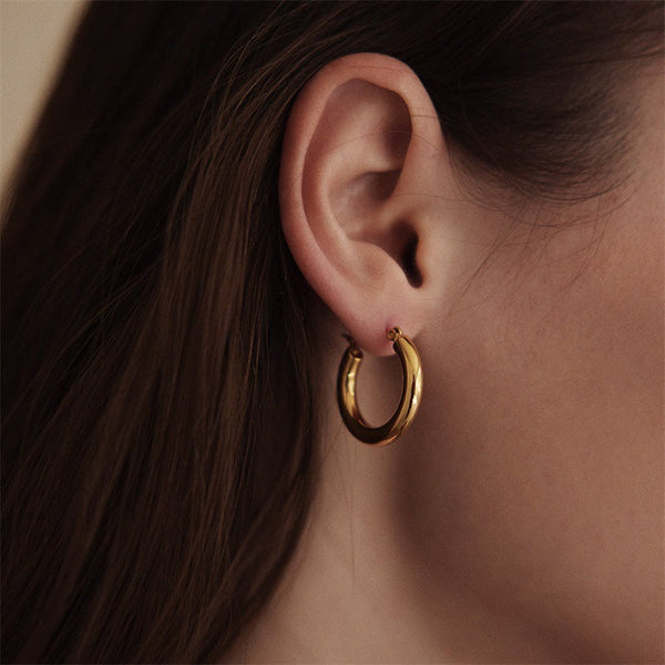 Veile Studios Broad Round Hoops In Gold Stainless Steel For Fashion Jewellery Collection Earrings