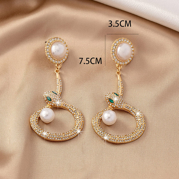 Veile Studios Gold Round Pearl With Crystal Accents And Snake Design For Women Earrings