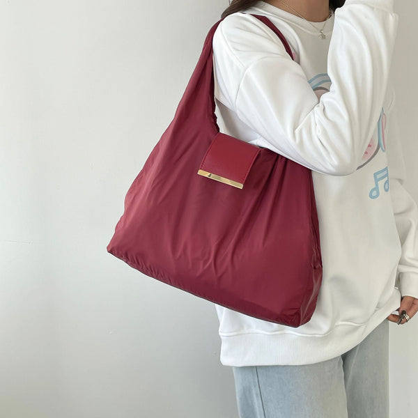 Wine Red Foldable Tote Bag With Built In Storage Pouch Compact Reusable Shopping That Packs Into Itself Ideal For Daily Carry And Eco Friendly Use Wom