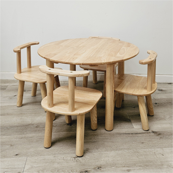 A Round Table And 4 Chairs Dining Tables