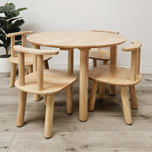 A Round Table And 4 Chairs Dining Tables