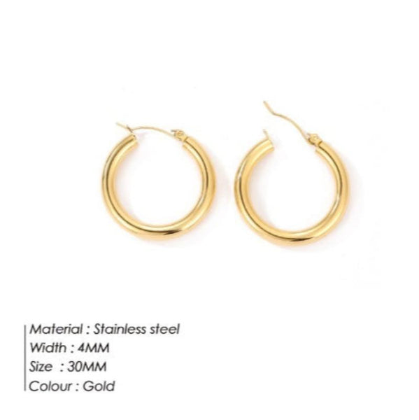 Veile Studios Broad Round Hoops In Gold Stainless Steel For Fashion Jewellery Collection Earrings